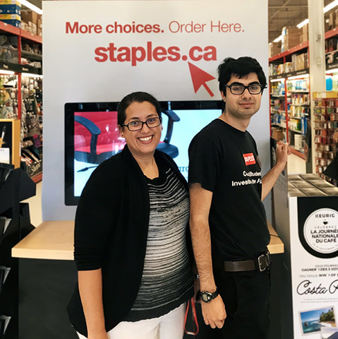 New Haven Team Member with client smiling to take a picture at Staples