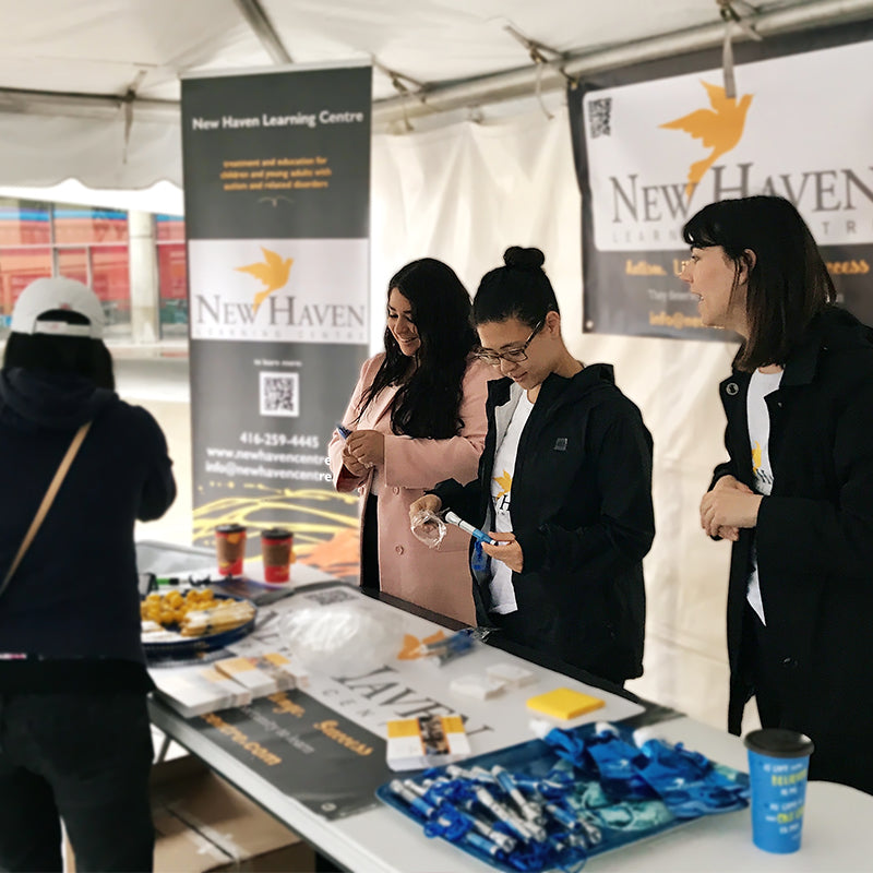 New Haven team members promoting the New Haven Learning Centre at an event